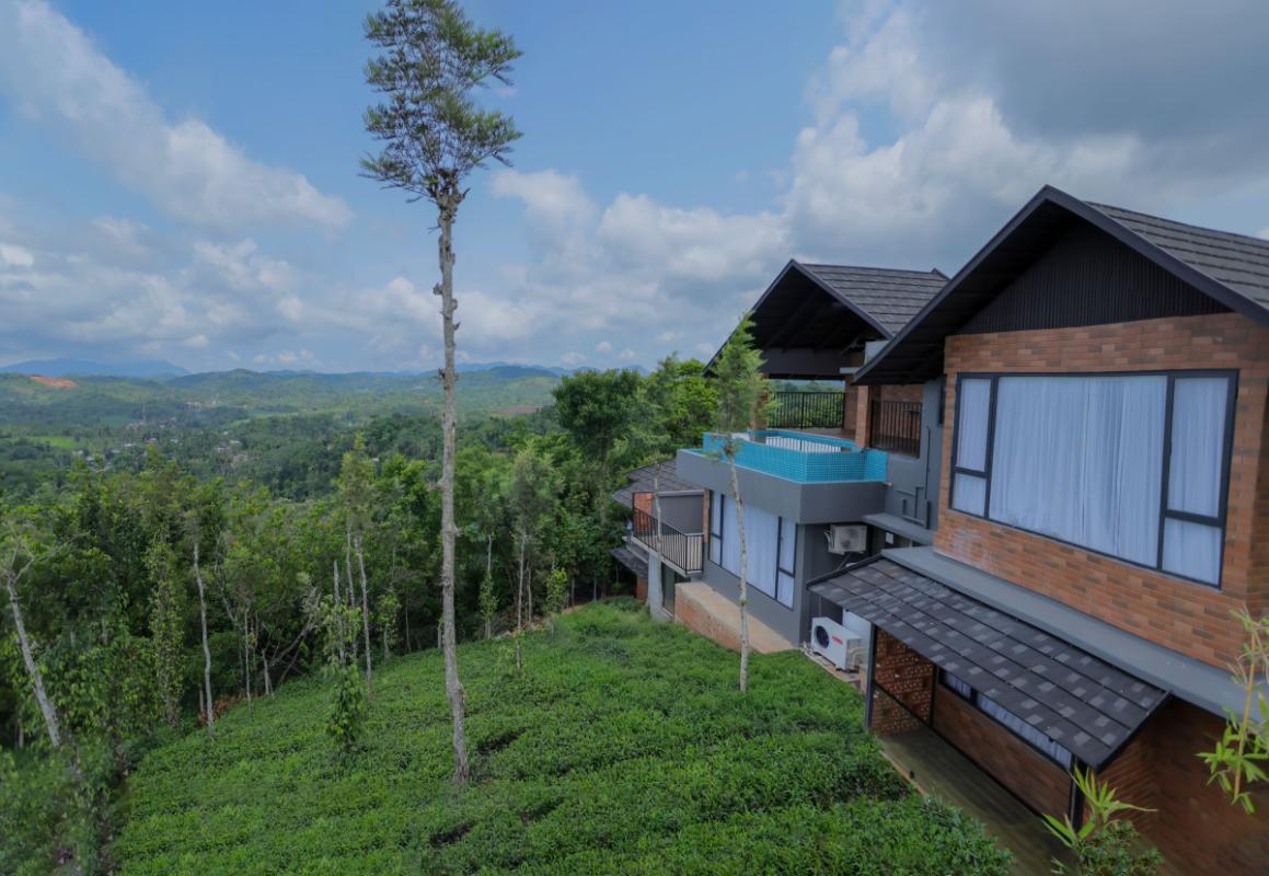 tea estate bedroom Mihra mist resort valat wayanad