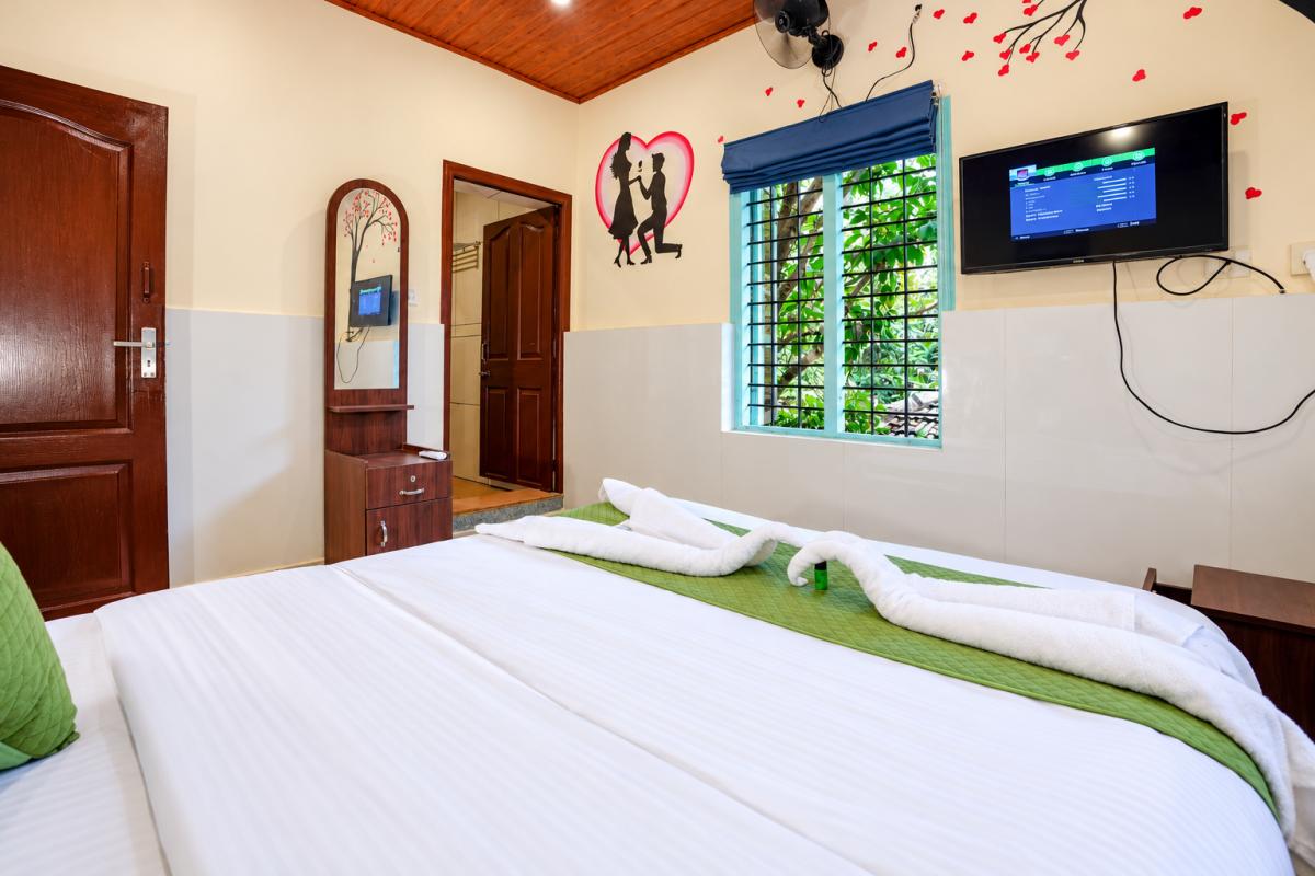 Cozy Guestroom with Towel Swans